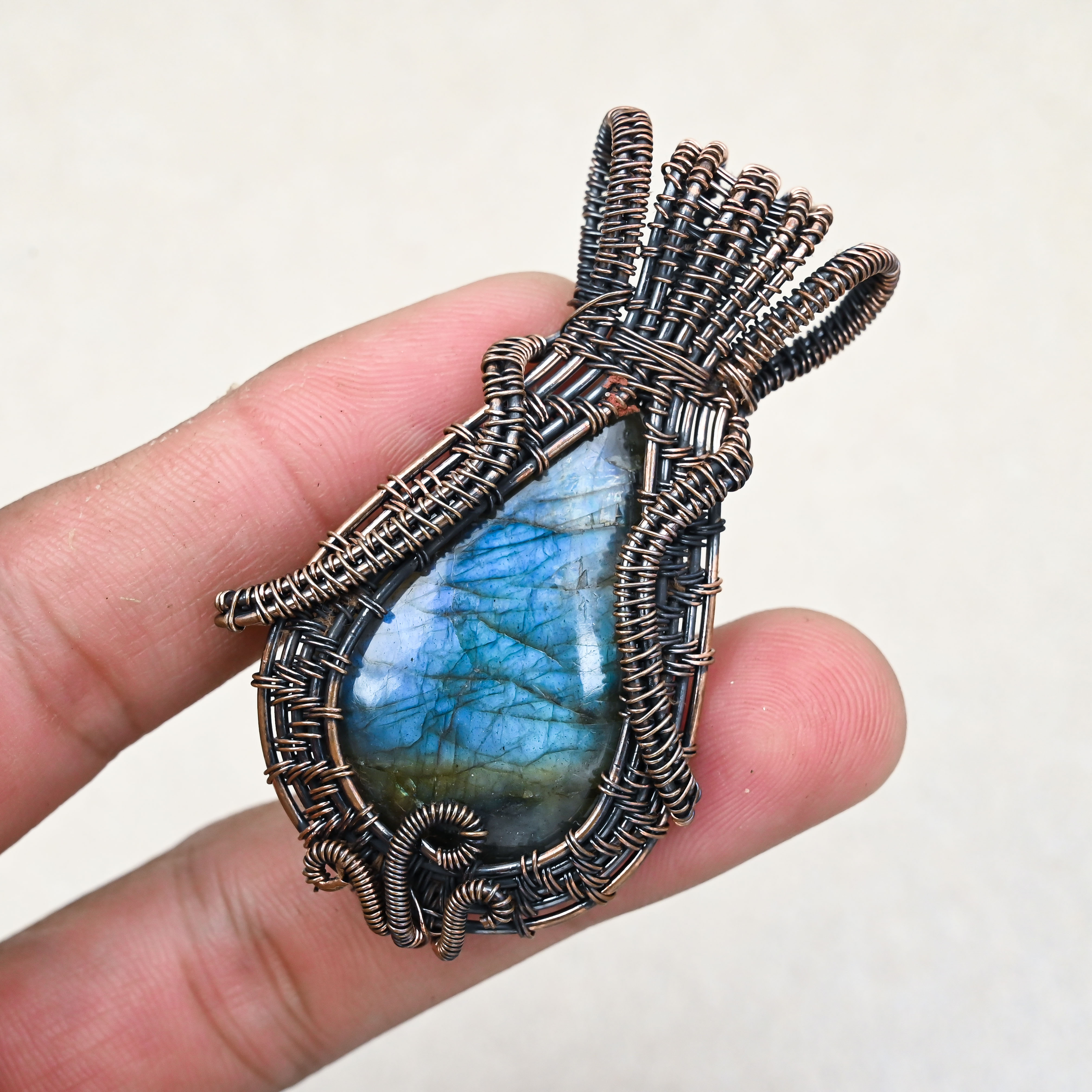 Natural Labradorite crystal pendant with copper wire wrap